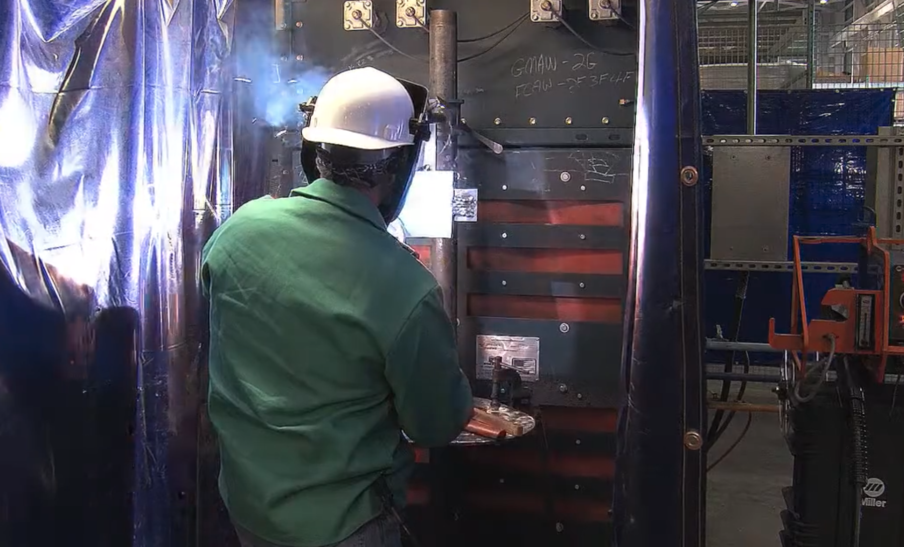 A welding operator training at Freight Car America.